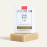 Little Seed Farm Rose Geranium Facial Healing Organic Soap Bar, a balancing cleanser for oily, dry, or combination skin, infused with uplifting geranium rose essential oil and finely ground rose petals to gently polish and soothe the skin.