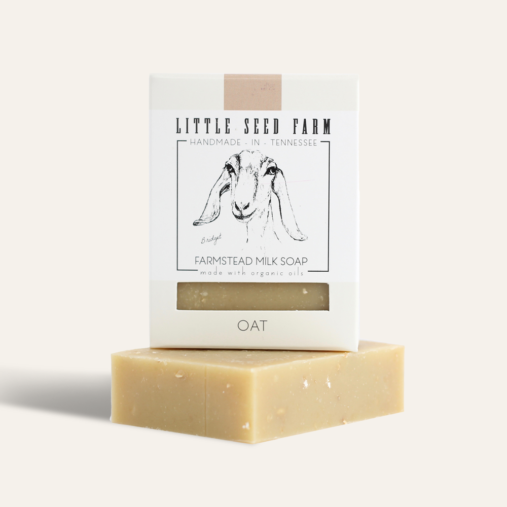 Little Seed Farm Oatmeal Scrub Bar made with organic goat’s milk, finely ground oats to exfoliate and soothe, plus olive and coconut oils for soft, calm, and balanced skin.