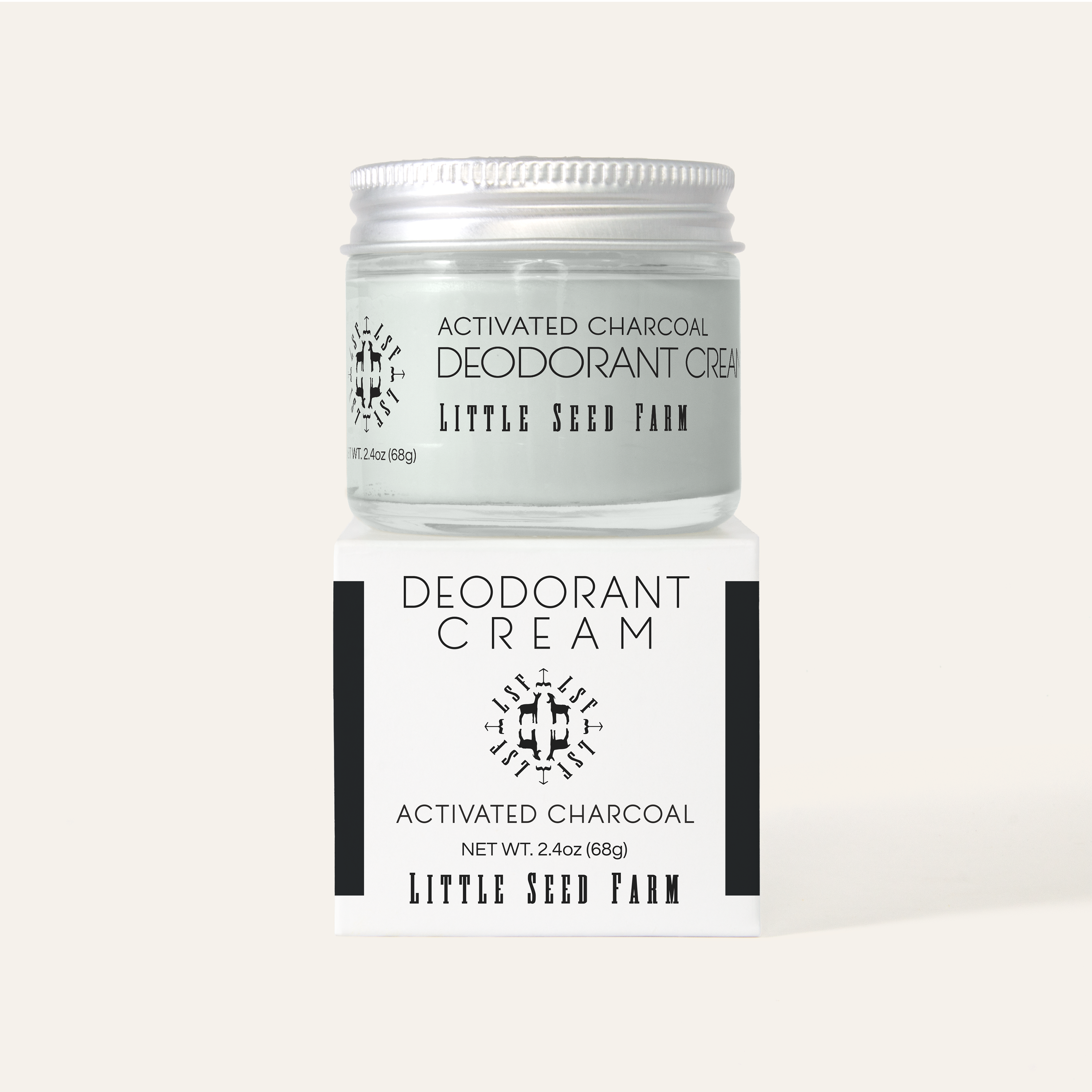 Activated Charcoal Deodorant Cream by Little Seed Farm in a glass jar, showcasing its sleek black formula and minimalist labe