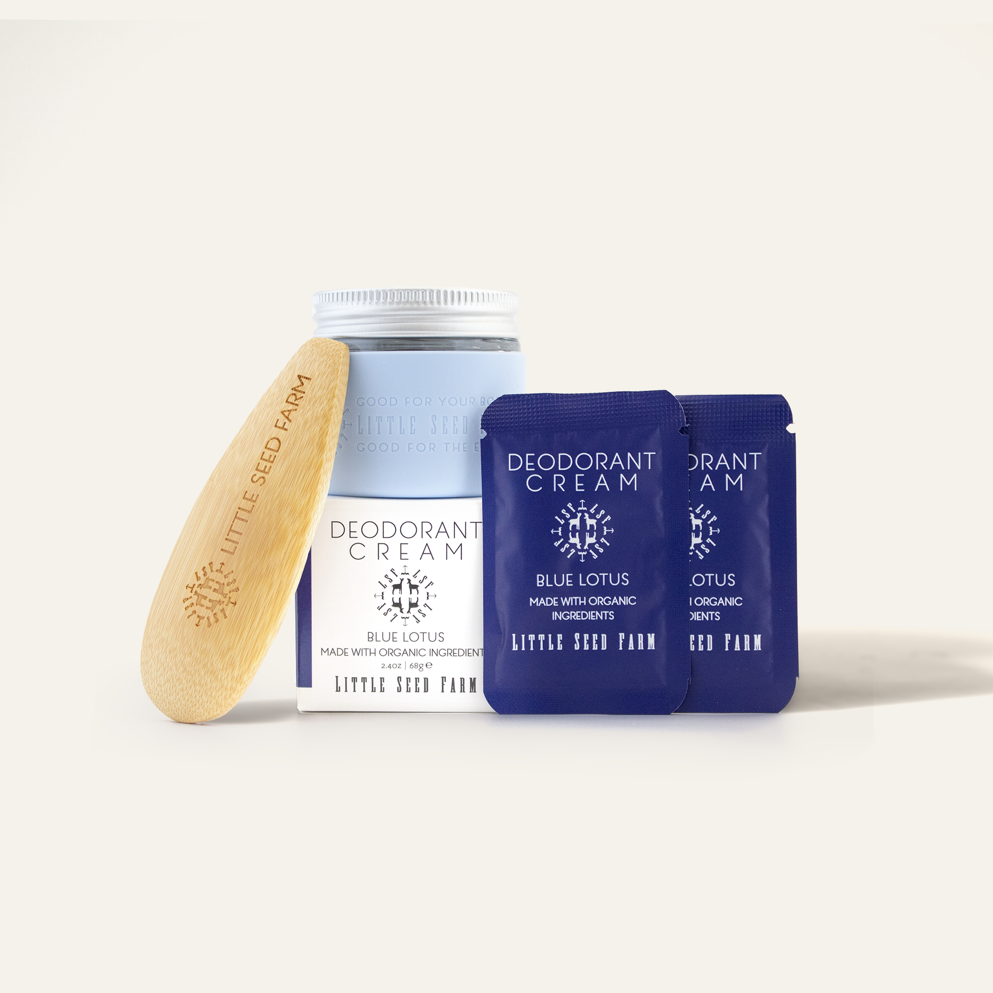 Blue Lotus deodorant cream with exotic floral scent and activated charcoal powder, included in the Little Seed Farm starter kit.