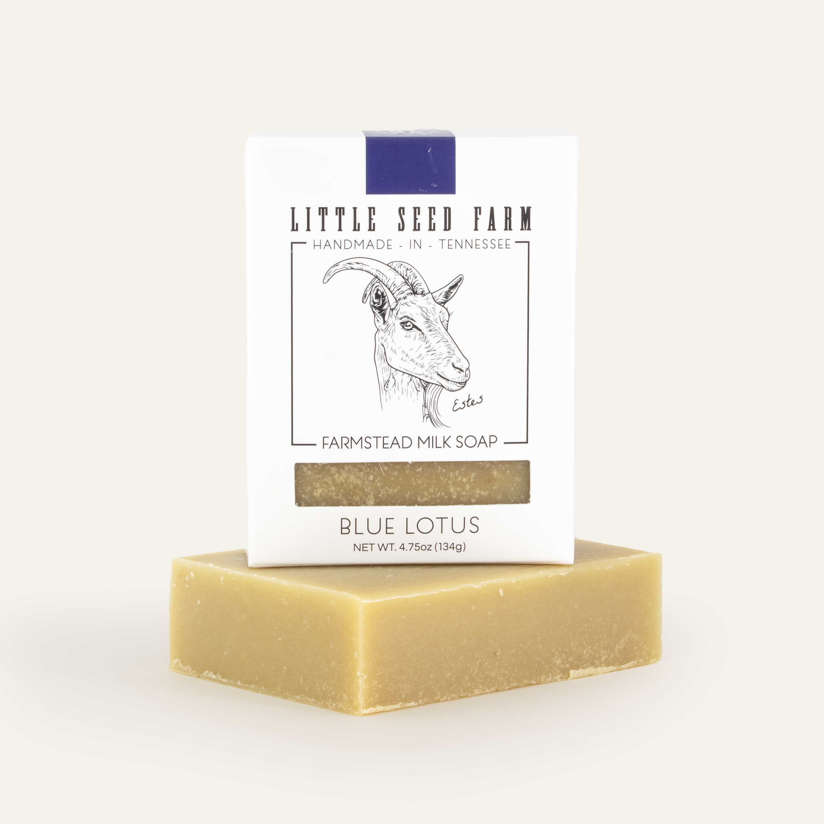 Blue Lotus goat milk soap bar by Little Seed Farm, presented with its eco-friendly packaging, crafted with nourishing ingredients and blue lotus essential oil for gentle, calming skincare.
