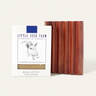 A Little Seed Farm Soap Bar + Dish Set, featuring a goat-illustrated milk soap bar and a grooved handmade cedar soap dish, is displayed together.