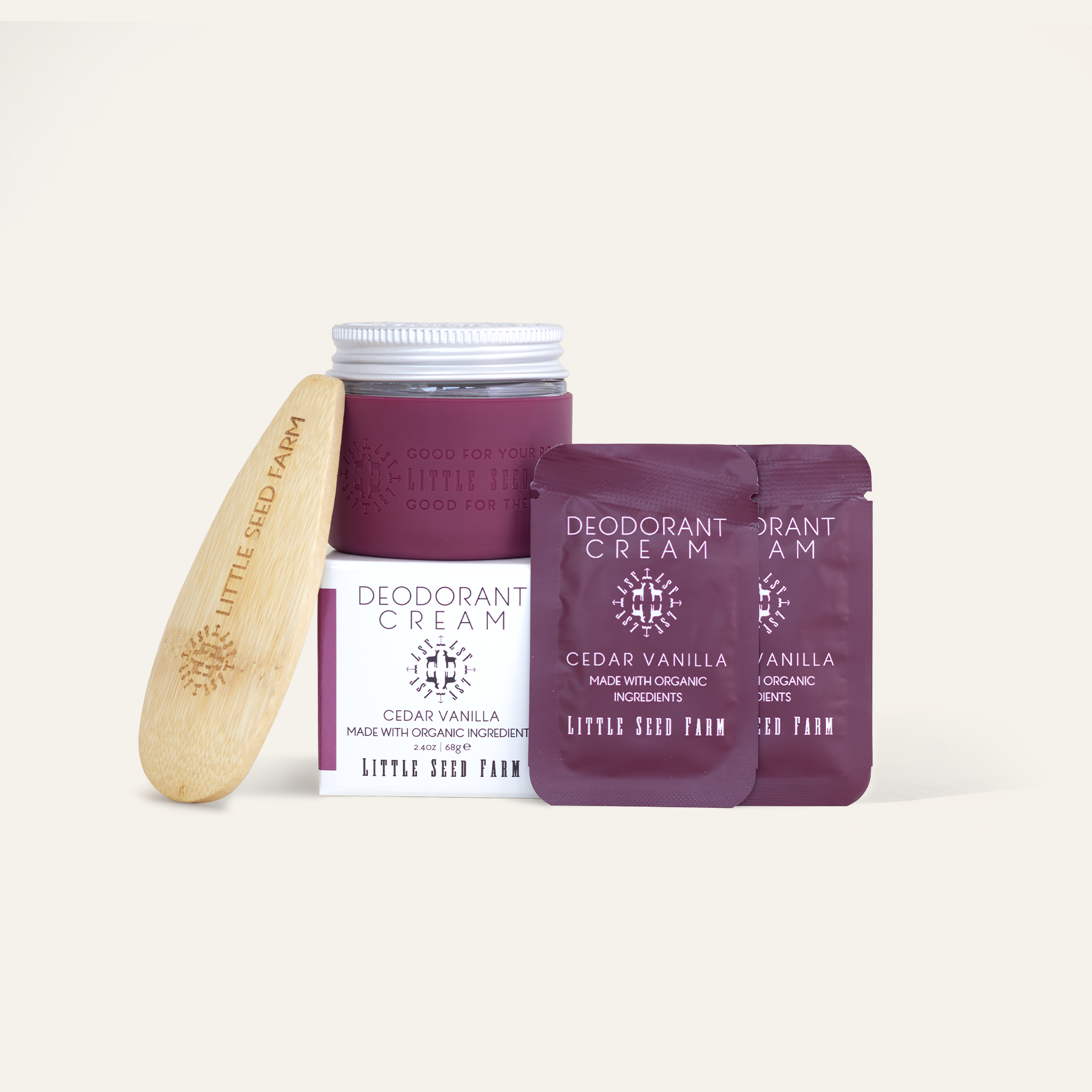 Cedar Vanilla deodorant cream with warm woodsy and vanilla aroma, charcoal-enhanced and aluminum-free in starter kit.