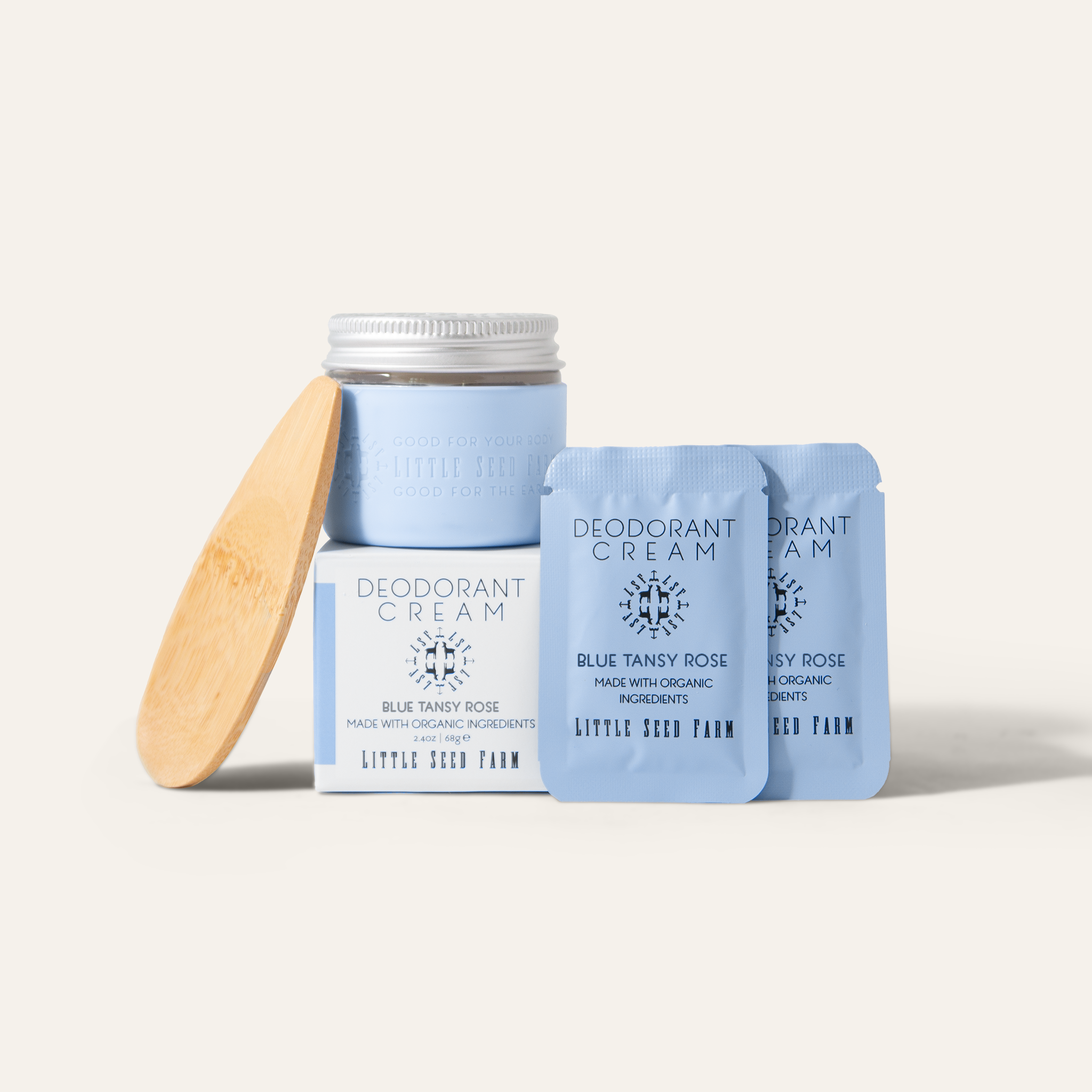 Blue Lotus deodorant cream with exotic floral scent and activated charcoal powder, included in the Little Seed Farm starter kit.