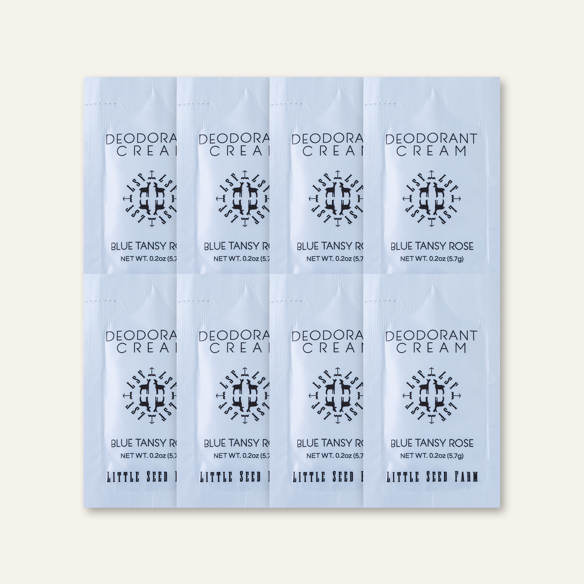 Top-down view of Little Seed Farm Deodorant Travel Pack with eight mini cream pouches, each offering aluminum-free, baking soda-free odor protection in clean, natural scents for 3–5 days of use.