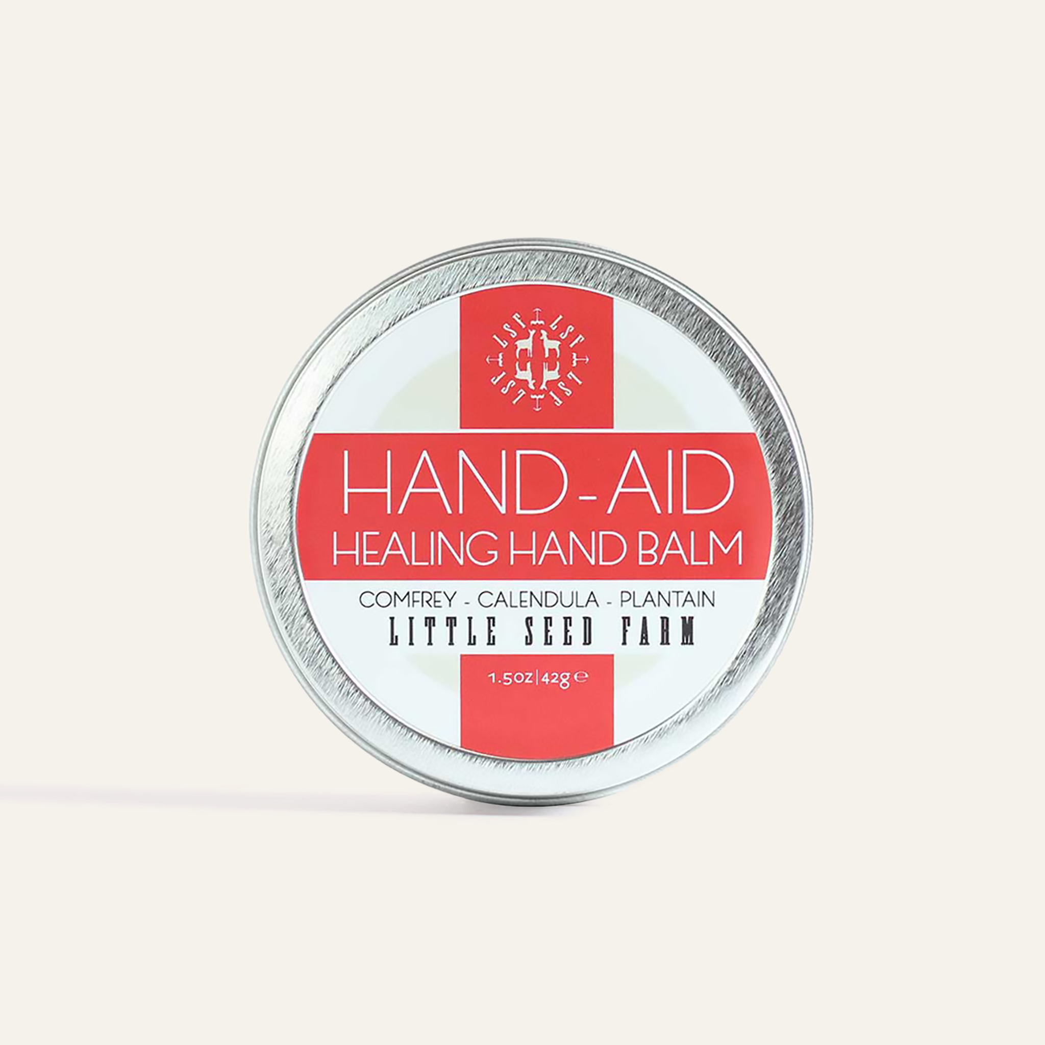 Little Seed Farm Original Hand‑Aid Healing Hand Balm, a potent organic salve infused with lemongrass, mint, and rosemary essential oils to soothe dry, cracked hands and cuticles”—crafted with herbally infused organic coconut oil, shea butter, beeswax, hemp seed oil and certified organic ingredients