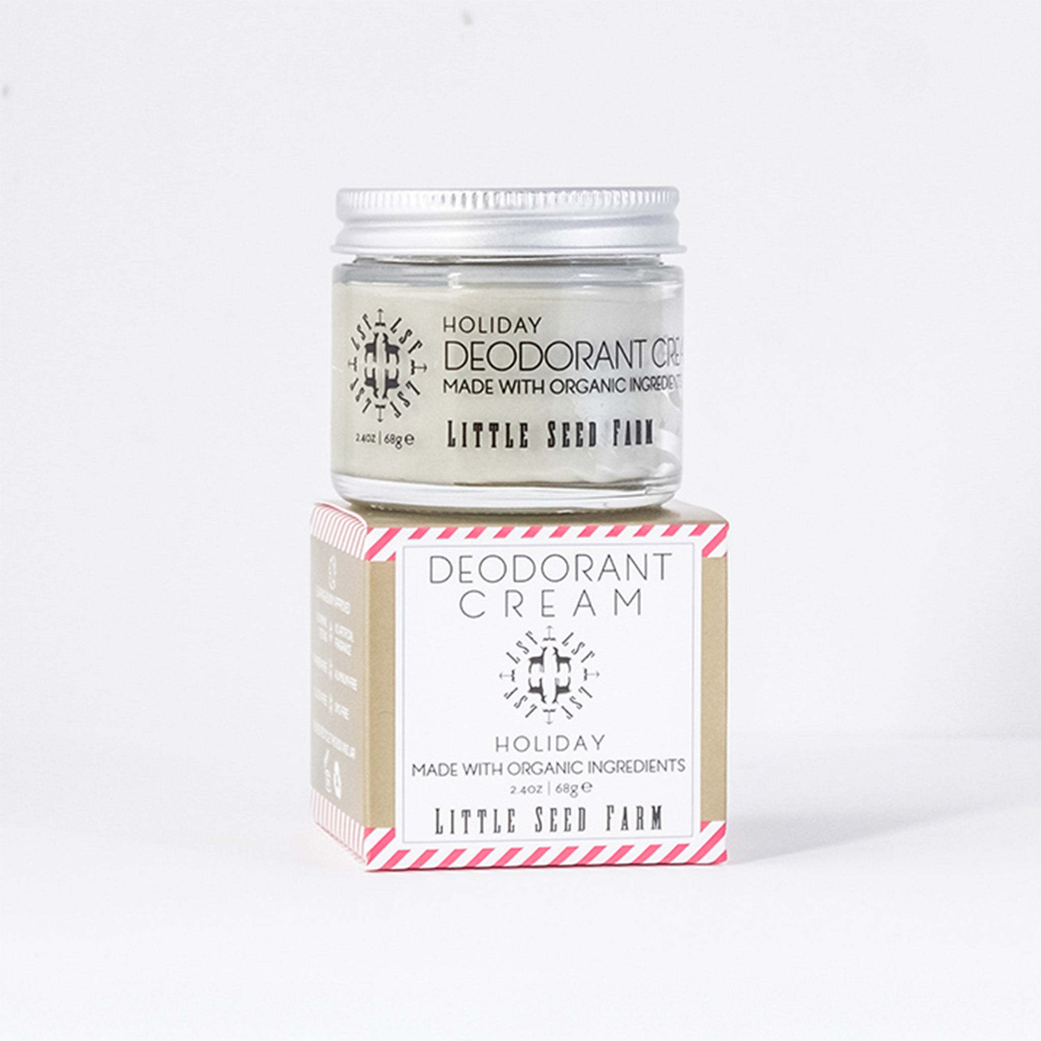 Little Seed Farm Holiday Deodorant Cream jar resting atop its matching box; a simple, elegant holiday presentation.