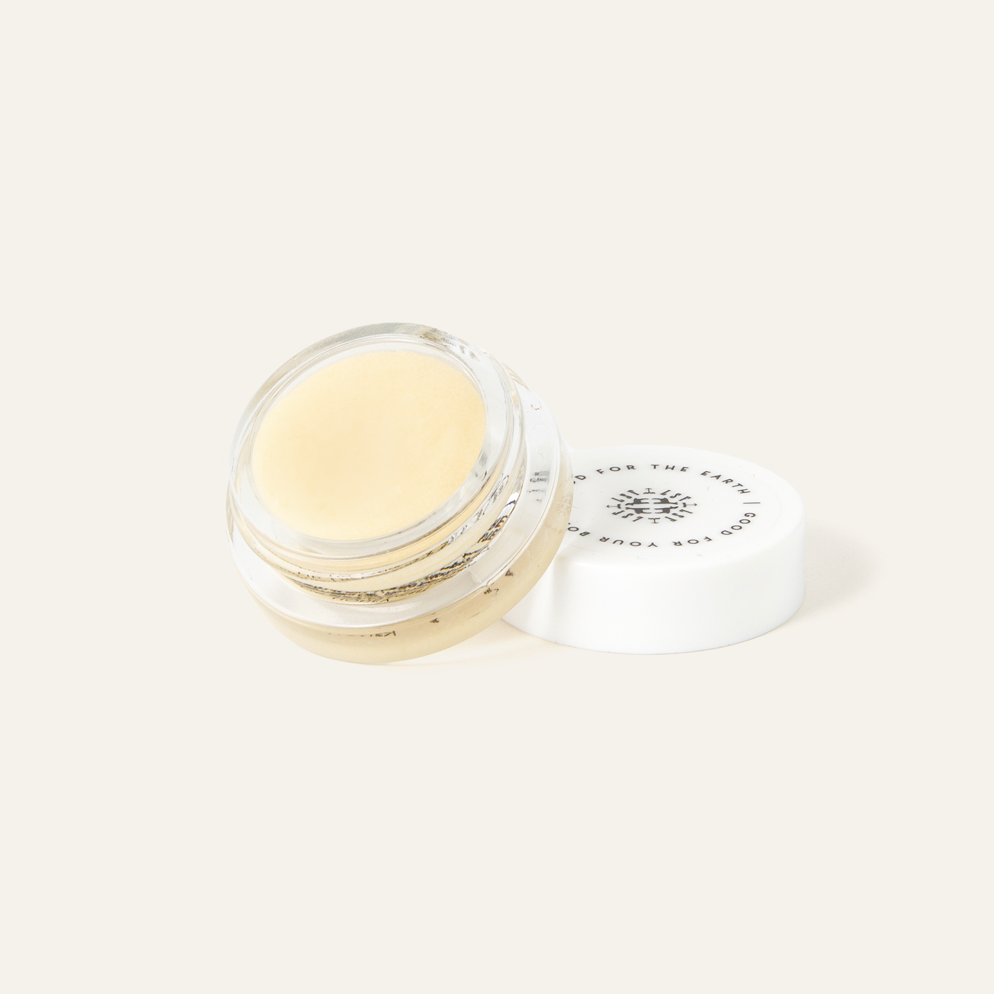 Little Seed Farm Honey Lip Treatment in a glass jar, featuring ultra-hydrating raw honey from the farm, plumping organic camellia oil, and soothing shea butter to nourish and exfoliate lips naturally.