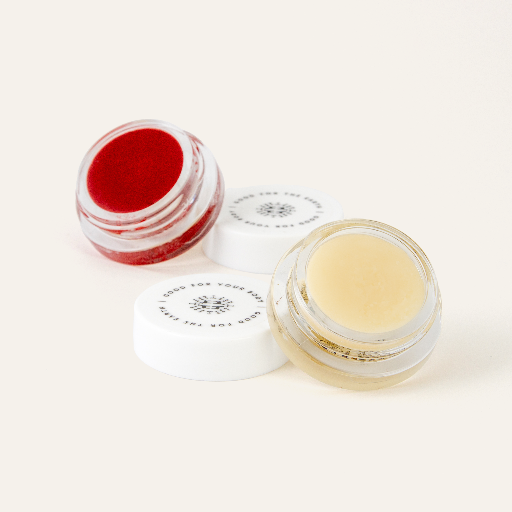 Little Seed Farm Lip Duo set featuring Honey Lip Treatment with raw farm honey and camellia oil for hydration, and Rose Lip Tint in a deep rose shade with berry undertones, nourishing lips, cheeks, and eyelids with organic shea butter and vitamin E.