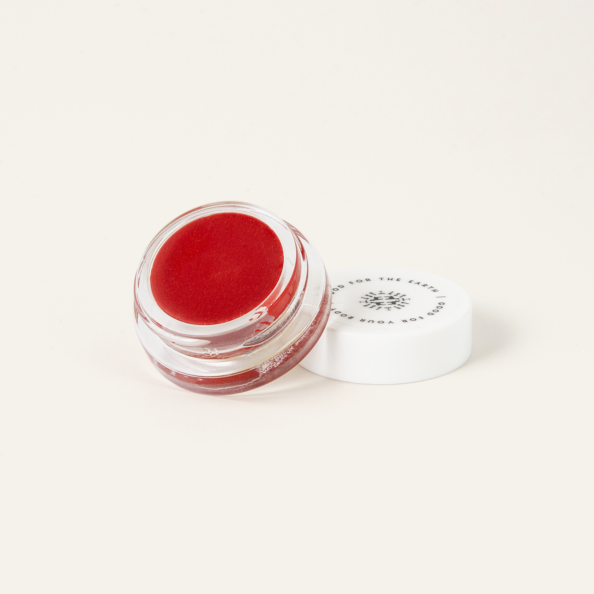 Little Seed Farm Rose Lip Tint in a deep, warm rose shade with a hint of berry, nourishing lips, cheeks, and eyelids with organic camellia oil, shea butter, and vitamin E for a natural flush of color.