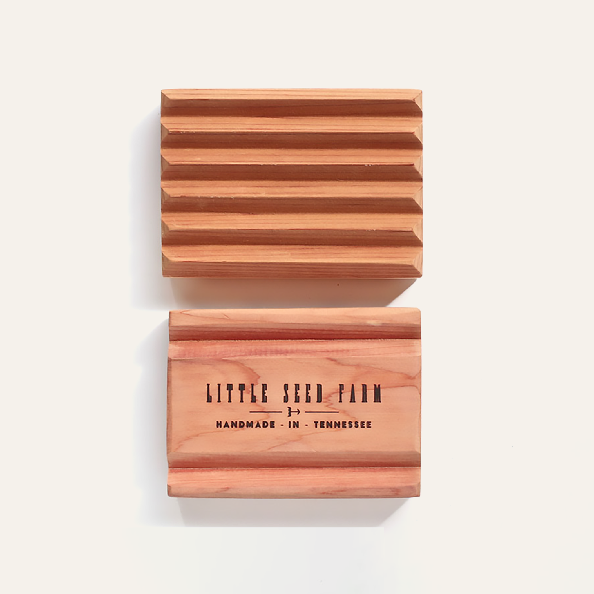 Sustainably crafted cedar soap dish designed to elevate and extend the life of bar soap by allowing proper drainage and airflow.