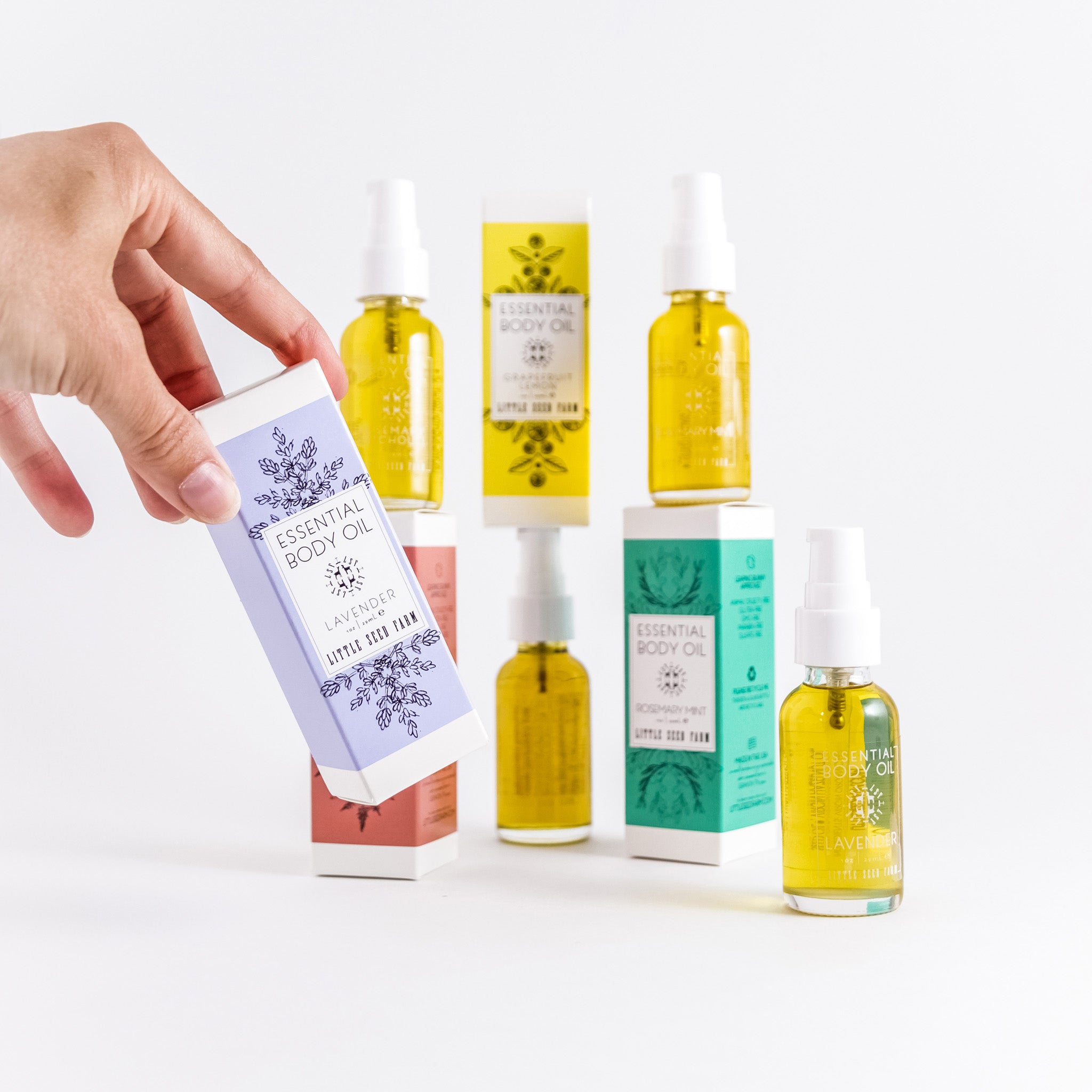 Little Seed Farm Mini Body Oil Collection featuring four travel-size, plant-based body oils made with nourishing organic ingredients and essential oil blends to hydrate and soften skin.