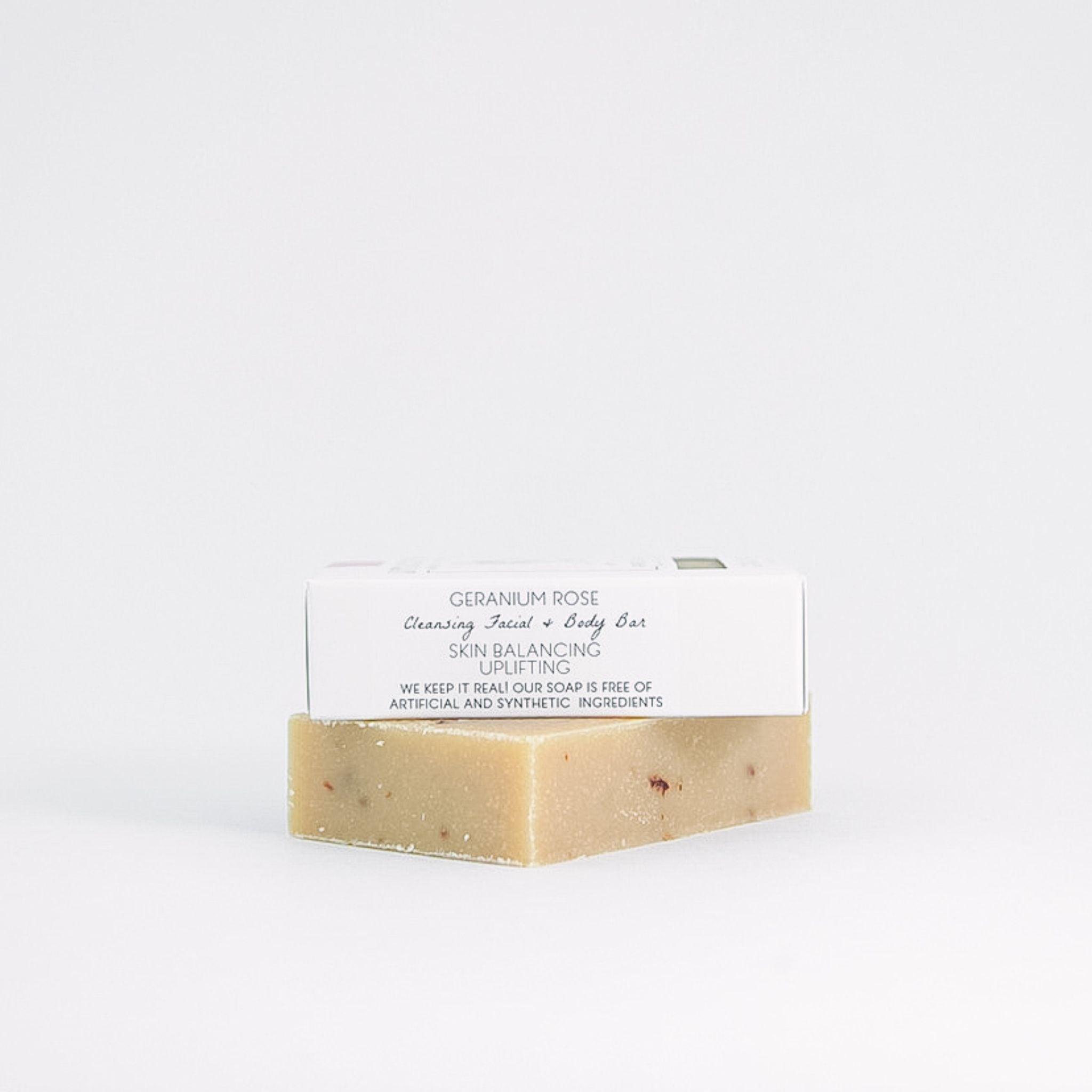 Eco‑friendly packaging of Geranium Rose bar soap highlighting plastic‑free, biodegradable materials and regenerative farm‑produced goat milk soap.