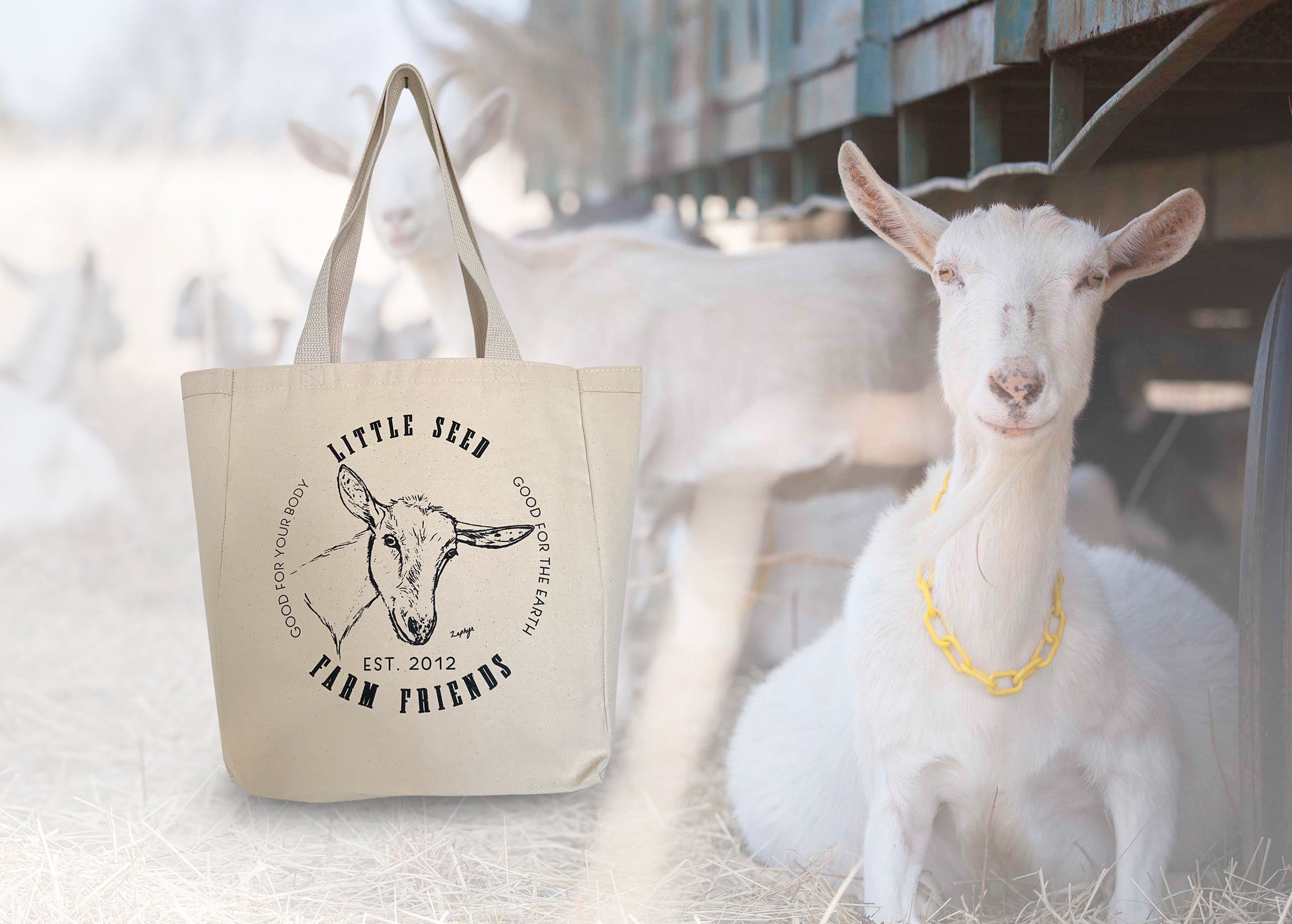 A neutral-colored tote bag featuring a minimalist goat illustration, showcasing its spacious design and sturdy handles.