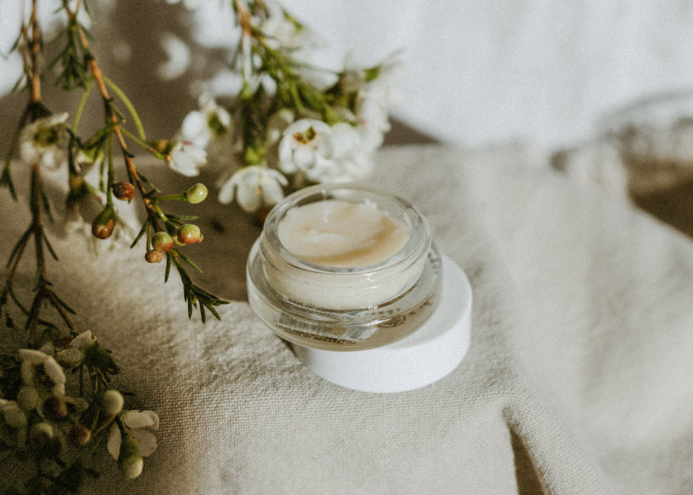 Little Seed Farm Honey Lip Treatment in a glass jar, featuring ultra-hydrating raw honey from the farm, plumping organic camellia oil, and soothing shea butter to nourish and exfoliate lips naturally.