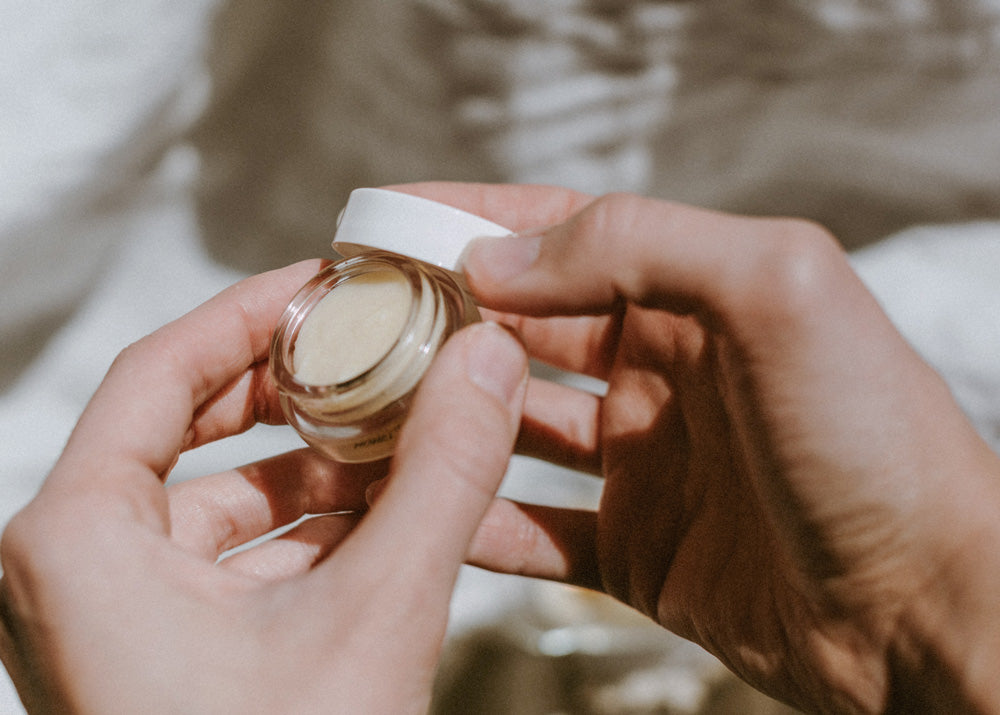 Little Seed Farm Honey Lip Treatment in a glass jar, featuring ultra-hydrating raw honey from the farm, plumping organic camellia oil, and soothing shea butter to nourish and exfoliate lips naturally.
