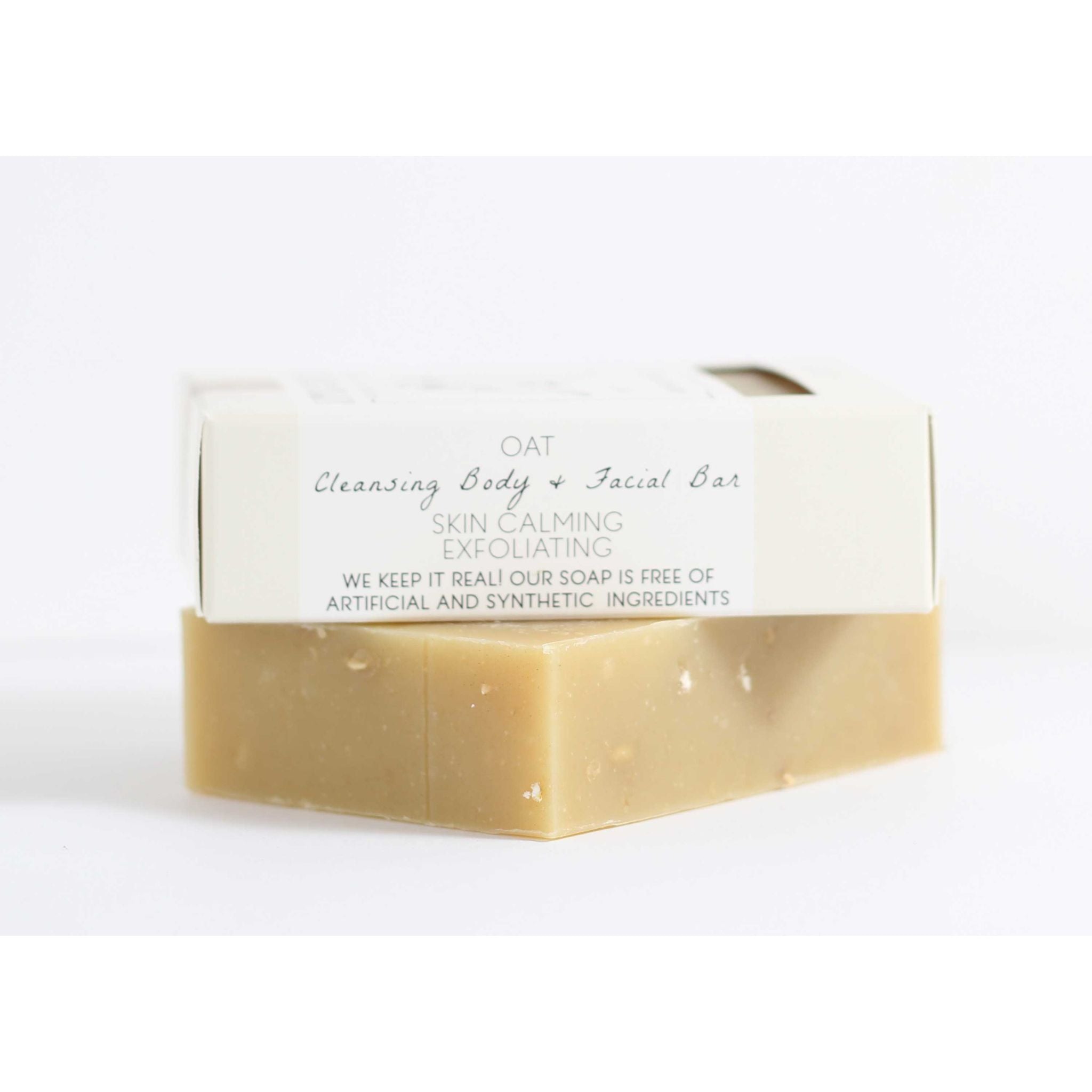 Ingredients list for the Oat Oatmeal Scrub Bar featuring certified organic oats, grass-fed goat’s milk rich in alpha‑hydroxy acids, olive oil, and coconut oil for moisturizing and gentle exfoliation.