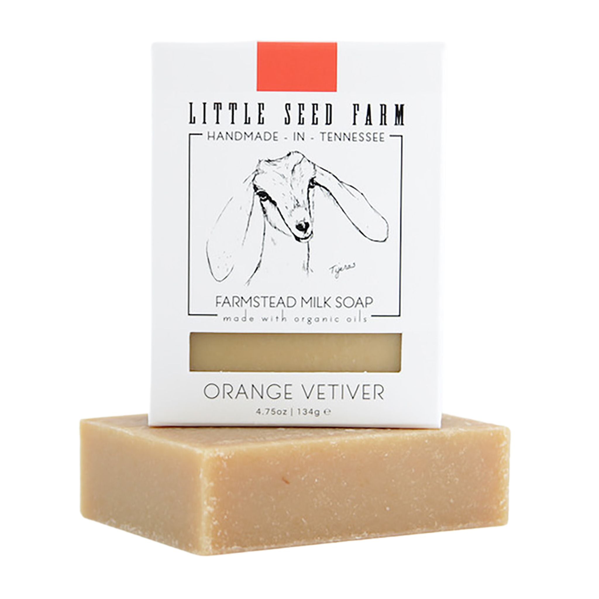 Eco‑friendly, biodegradable packaging of the Orange Vetiver goat’s milk soap emphasizing sustainable, plastic‑free materials and regenerative farm‑sourced ingredients.