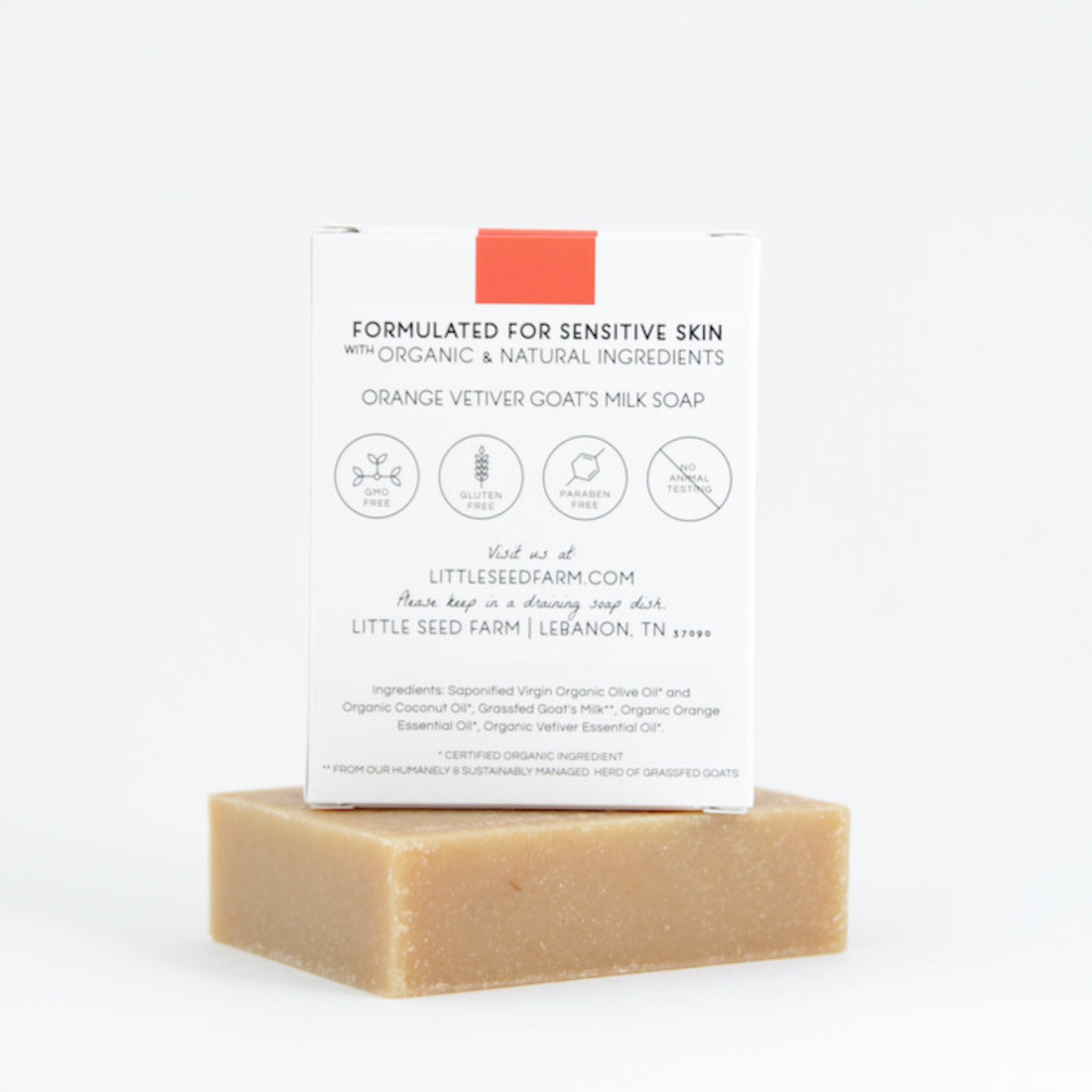 Ingredients list for Orange Vetiver goat’s milk soap featuring grass‑fed goat’s milk, certified organic olive and coconut oils, sweet orange peel oil, and vetiver root oil for nourishing and healing skin.