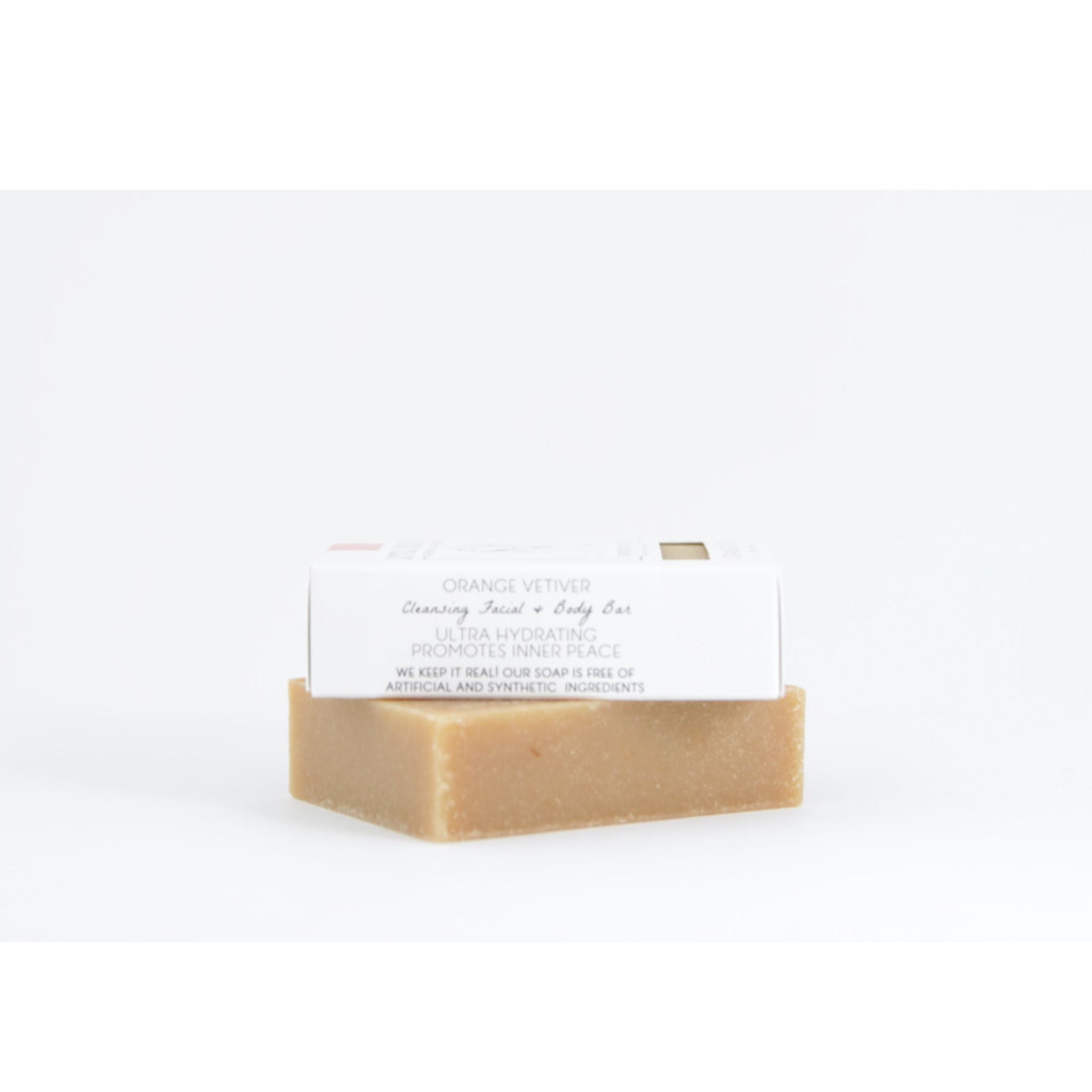Ingredients list for Orange Vetiver goat’s milk soap featuring grass‑fed goat’s milk, certified organic olive and coconut oils, sweet orange peel oil, and vetiver root oil for nourishing and healing skin.