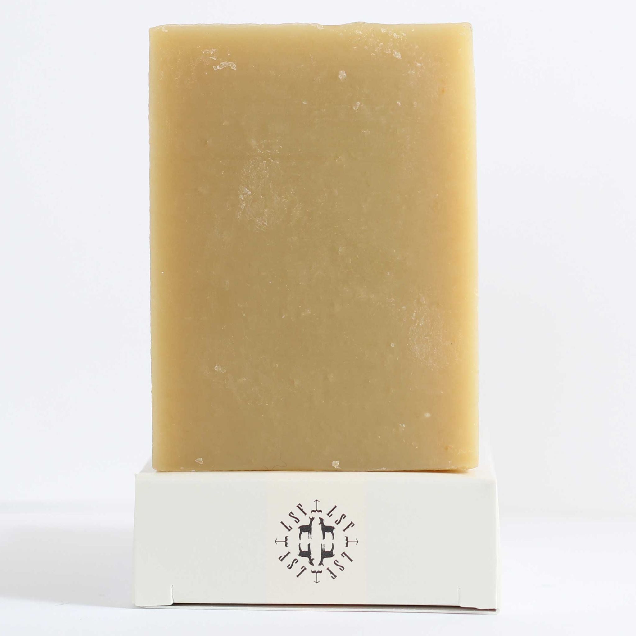 Eco‑friendly packaging of Little Seed Farm unscented goat’s milk soap highlighting biodegradable, plastic‑free materials and cruelty‑free formula made from certified organic ingredients.
