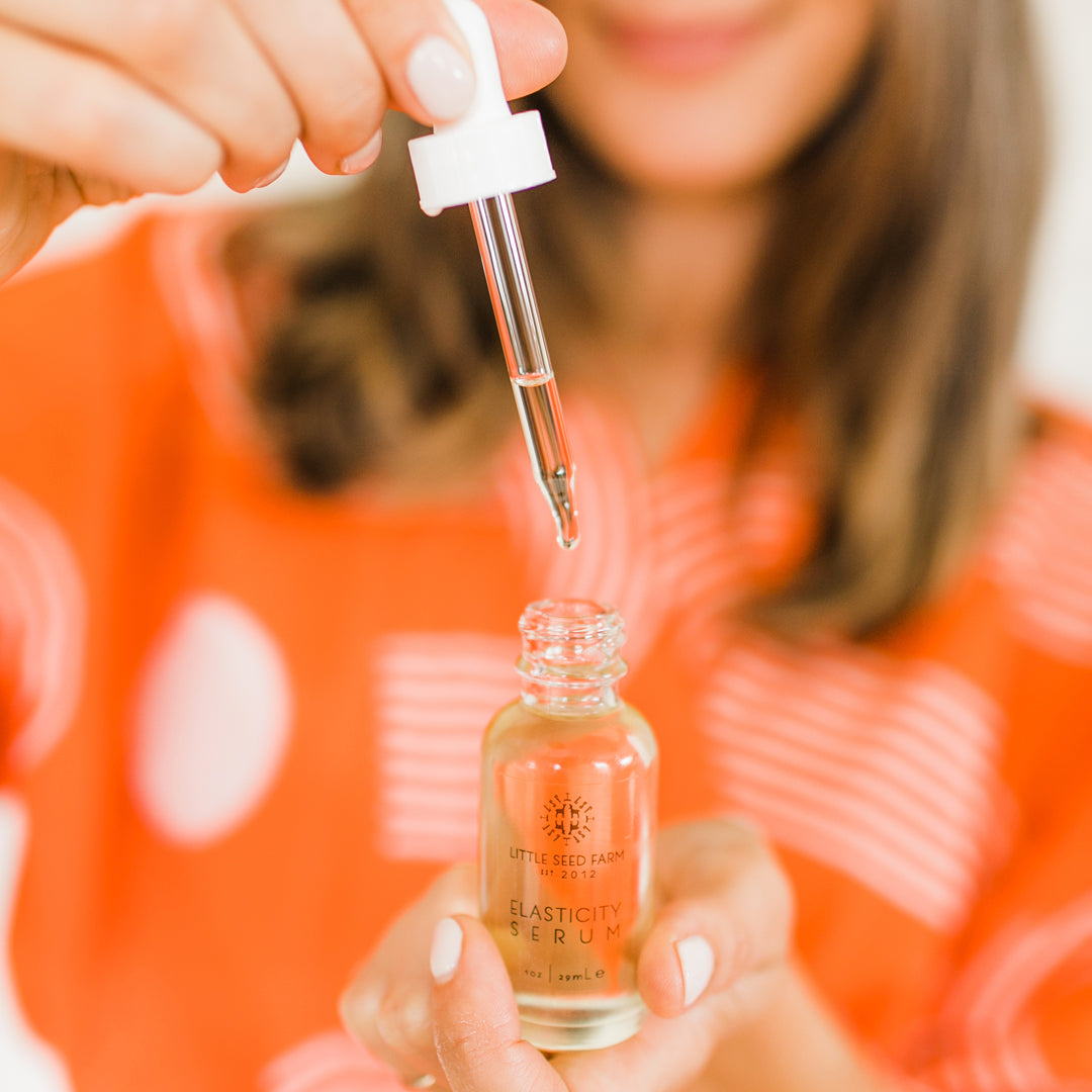 Elasticity Serum by Little Seed Farm made with virgin hazelnut oil, rosemary, spearmint, geranium, lavender and vitamin E to tone, moisturize, and stimulate collagen for firmer, glowing skin