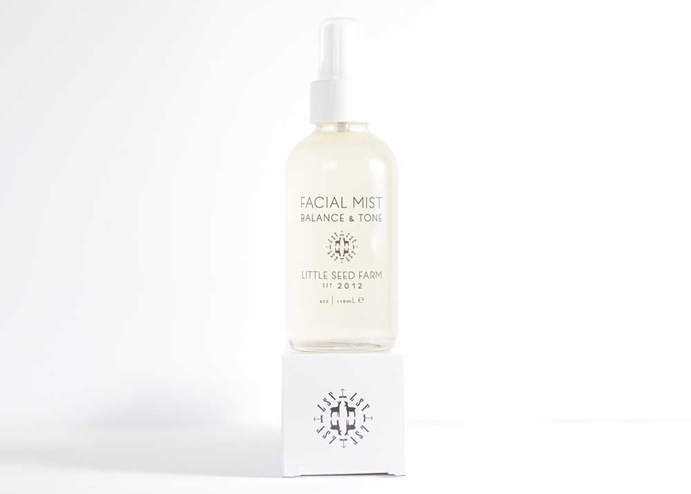 Little Seed Farm Toning Facial Mist with organic aloe and witch hazel, featuring calming blue German chamomile and marshmallow root extract to soothe, balance pH, and refine pores for all skin types.