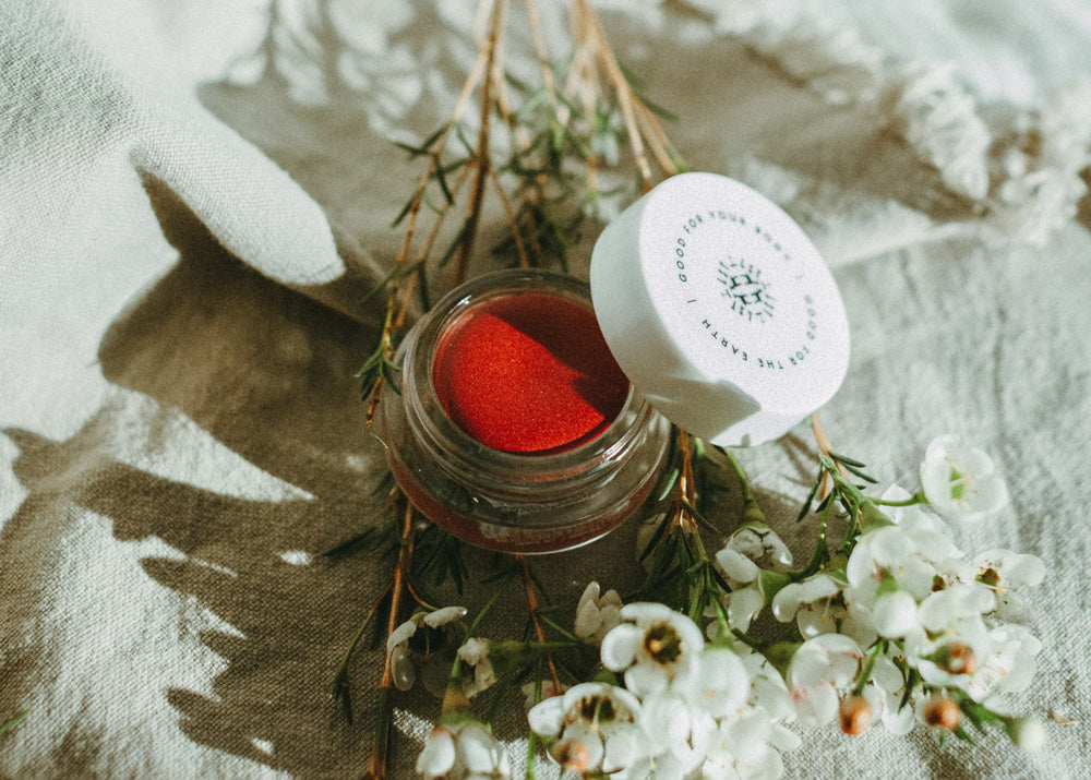 Little Seed Farm Rose Lip Tint in a deep, warm rose shade with a hint of berry, nourishing lips, cheeks, and eyelids with organic camellia oil, shea butter, and vitamin E for a natural flush of color.