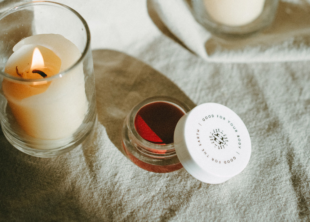 Little Seed Farm Rose Lip Tint in a deep, warm rose shade with a hint of berry, nourishing lips, cheeks, and eyelids with organic camellia oil, shea butter, and vitamin E for a natural flush of color.