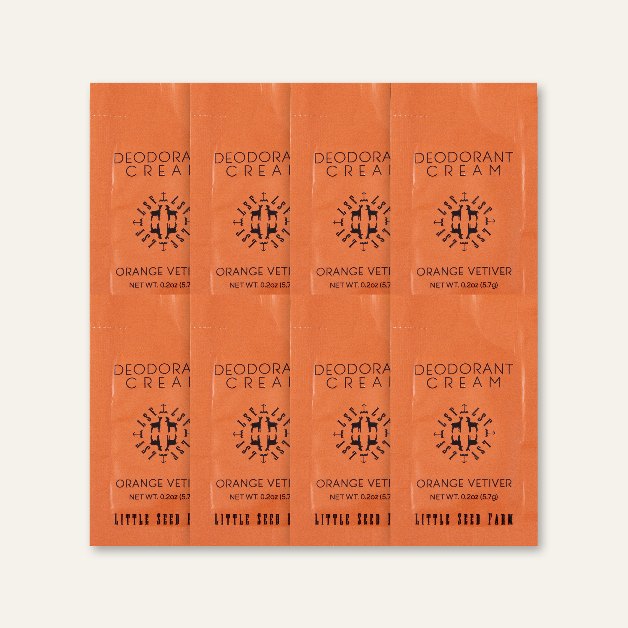 A group of 8 Little Seed Farm Orange Vetiver deodorant cream samples on a beige background.